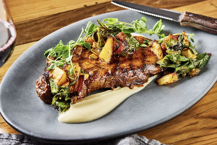 Wine Bar George signature dishes Crispy Mac & Cheese Bites
Steak Frites
Skirt Steak